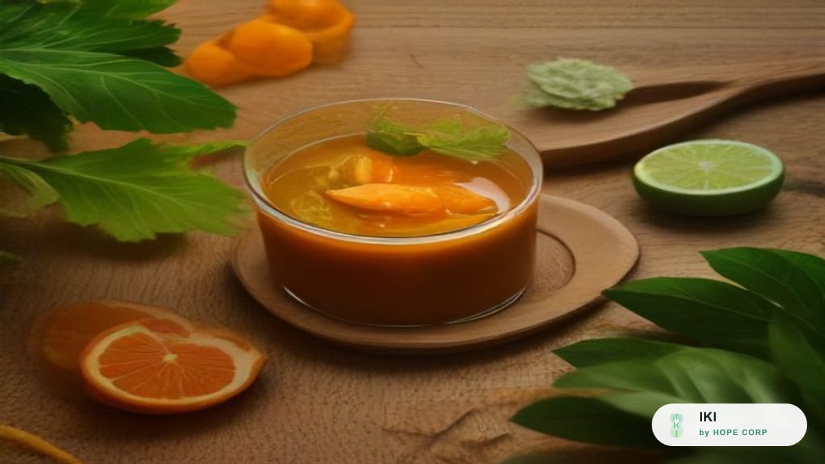 Mâm thực phẩm giao mùa gồm rau lá xanh, cam quýt, gừng và các loại hạt